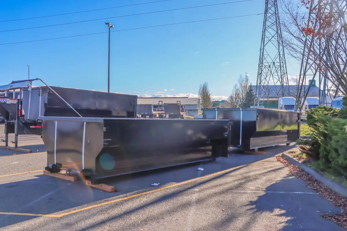 Roll-off dumpster ready for waste disposal at job site for Yard Waste Dumpster Rental in Boonville